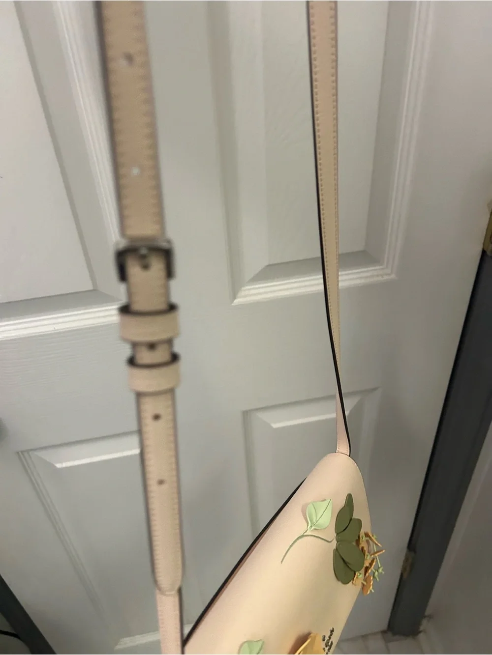 NWOT KATE SPADE floral appliqué leather crossbody bag.